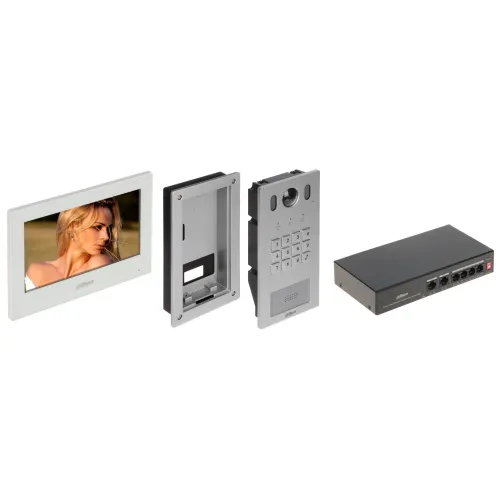 Na zdjęciu widoczny jest zestaw wideodomofonu składający się z monitora, panelu zewnętrznego z klawiaturą oraz modułu zasilającego. Monitor wyświetla obraz kobiety, a panel zewnętrzny posiada miejsce na kamerę i klawiaturę numeryczną.