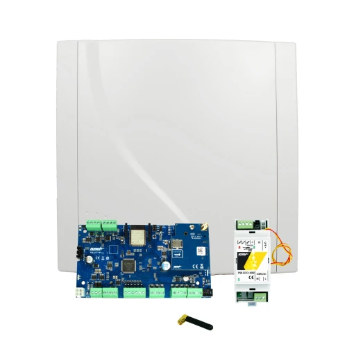 Na zdjęciu znajduje się centrala alarmowa Ropam NeO, przedstawiona z otwartą obudową, ukazującą wewnętrzne komponenty elektroniczne. Obok centrali leżą dodatkowe elementy, takie jak moduł komunikacyjny i antena.