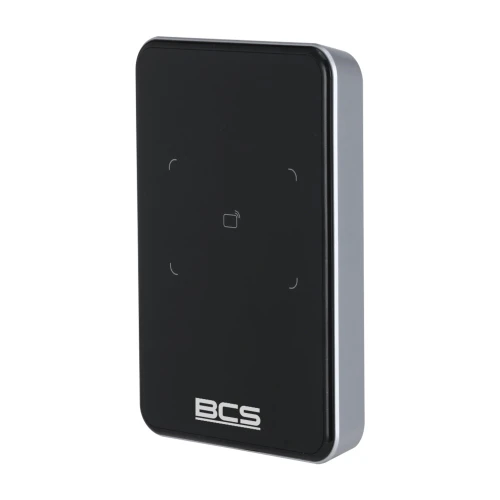 Na zdjęciu znajduje się czarny czytnik kart zbliżeniowych z logo BCS na dole. Urządzenie ma prostokątny kształt z zaokrąglonymi krawędziami i jest umieszczone na białym tle.