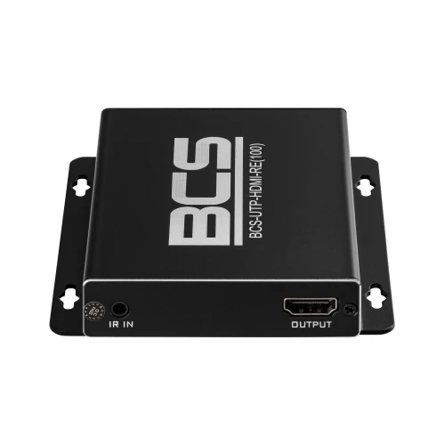Czarny odbiornik HDMI z logo BCS na górze, posiadający porty IR IN i OUTPUT. Urządzenie ma prostokątny kształt z otworami montażowymi po bokach.