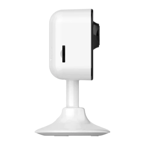 Biała kamera bezpieczeństwa na stojaku, widoczna z profilu. Urządzenie ma nowoczesny design z czarnymi akcentami wokół obiektywu.