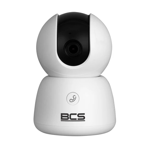 Biała, obrotowa kamera wewnętrzna z czarnym obiektywem umieszczonym centralnie. Na dolnej części kamery widnieje logo "BCS".