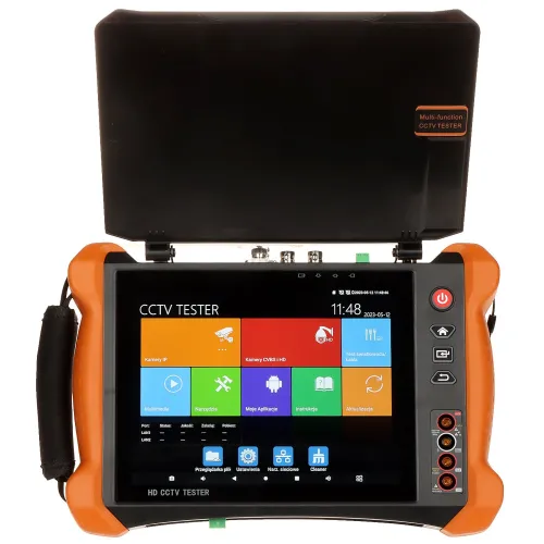 Na zdjęciu znajduje się urządzenie HD CCTV Tester z otwartą pokrywą, prezentujące kolorowy ekran z różnymi ikonami aplikacji i menu głównego. Obudowa urządzenia jest pomarańczowo-czarna, z widocznymi przyciskami i złączami po bokach.