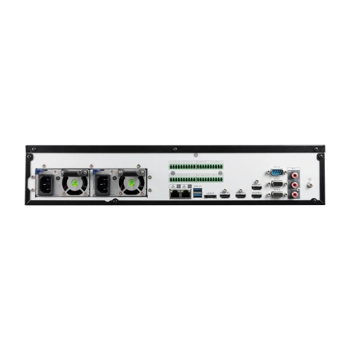 Zdjęcie przedstawia tylny panel rejestratora IP BCS z różnorodnymi portami i złączami, w tym zasilaniem, USB, HDMI, VGA oraz audio. Widoczne są również wentylatory chłodzące i złącza sieciowe.