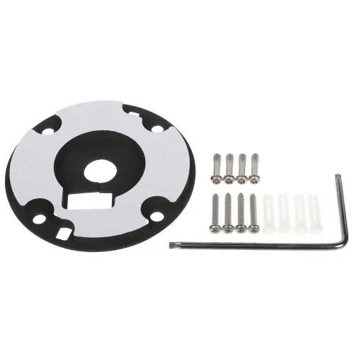 Na zdjęciu znajduje się okrągła, czarno-biała płytka montażowa z otworami, obok której leży zestaw sześciu srebrnych śrub z kołkami oraz klucz imbusowy. Elementy te są ułożone na białym tle, co podkreśla ich kształt i detale.