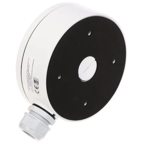 Okrągła, biała obudowa montażowa z czarną przednią częścią i otworami montażowymi. Widoczny jest również złącze kablowe na dolnej części obudowy.