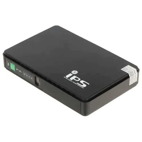 Czarny zasilacz UPS z logo "IPS" na górze, posiadający porty USB i wskaźniki LED na przedniej stronie. Urządzenie ma prostokątny kształt i kompaktowy design.